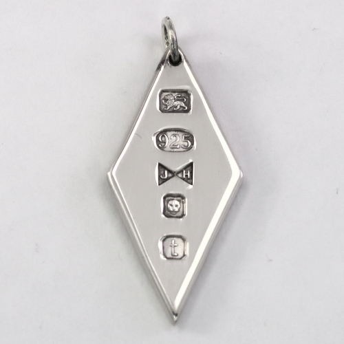 Diamond shaped silver ingot